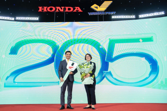 Honda Viet Nam va Buu dien Viet Nam day manh hop tac mo rong du an su dung xe dien giao hang - 4