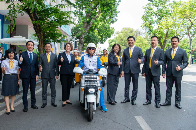 Honda Viet Nam va Buu dien Viet Nam day manh hop tac mo rong du an su dung xe dien giao hang - 7